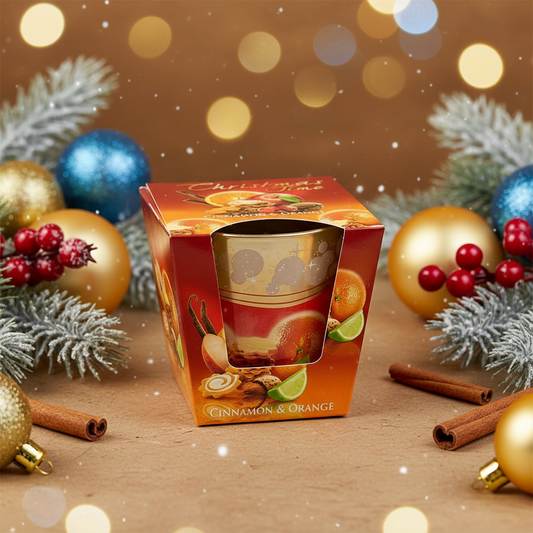 Christmas Time cinnamon and orange candle with festive background